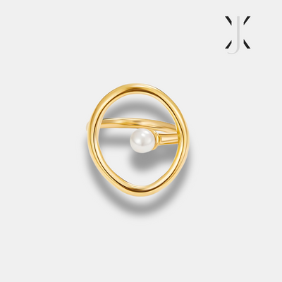 Anillo de oro con perla de melisa