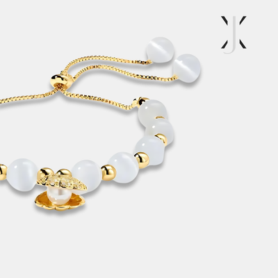Pulsera de cuentas de ópalo y conchas marinas