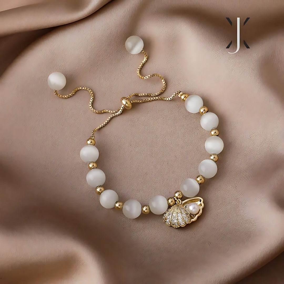 Pulsera de cuentas de ópalo y conchas marinas