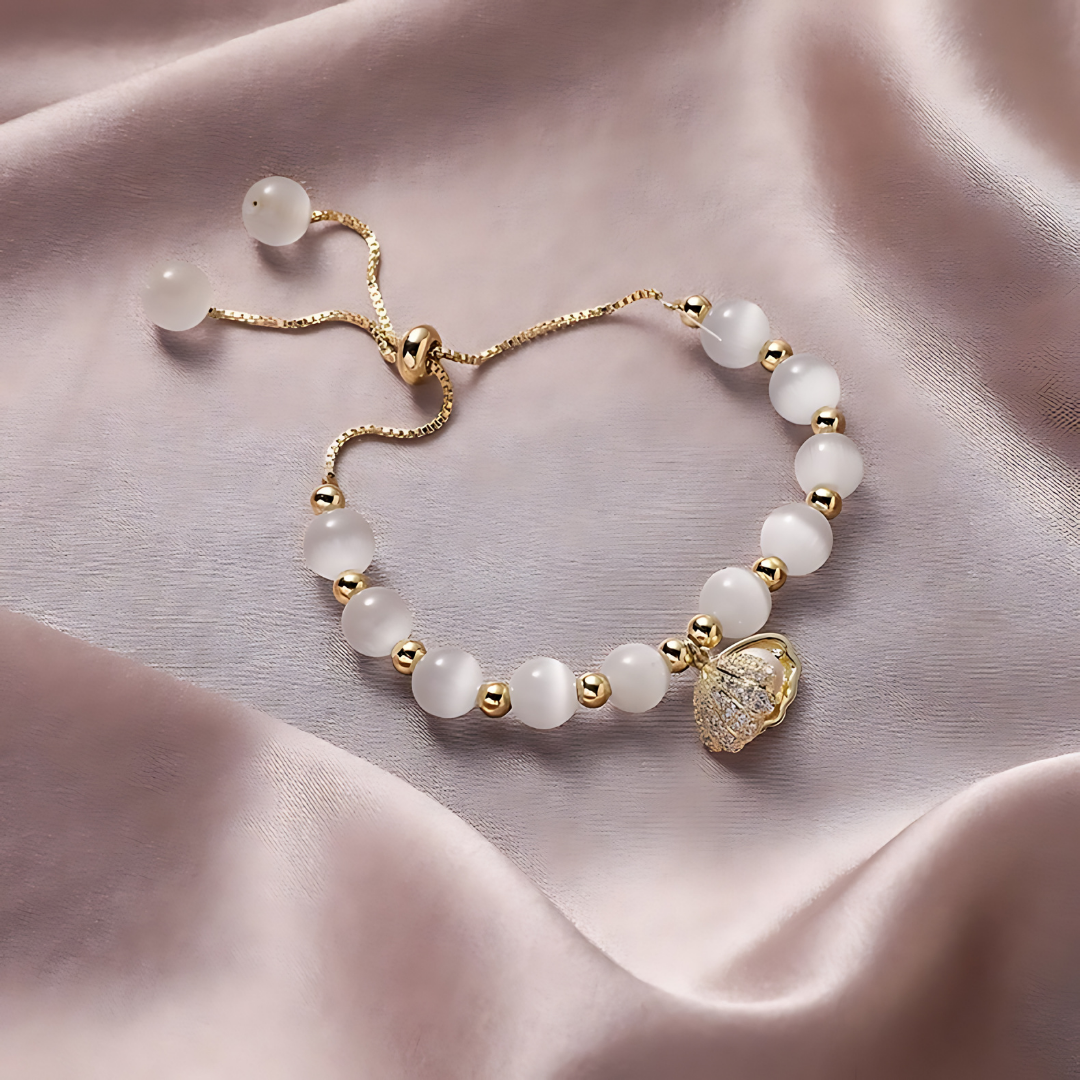 Pulsera de cuentas de ópalo y conchas marinas