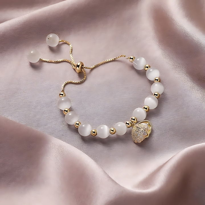 Pulsera de cuentas de ópalo y conchas marinas