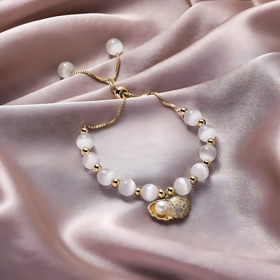 Pulsera de cuentas de ópalo y conchas marinas