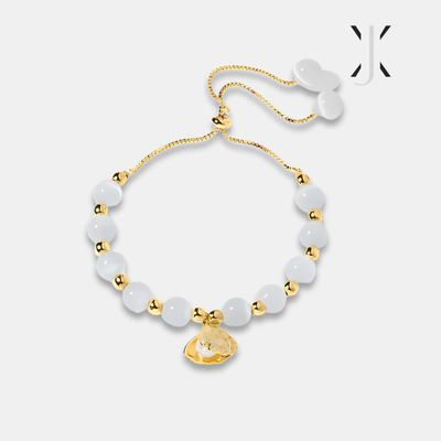 Pulsera de cuentas de ópalo y conchas marinas
