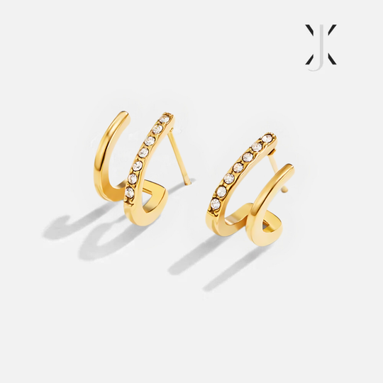 Krallenohrringe aus 18 Karat Gold mit Kristallen
